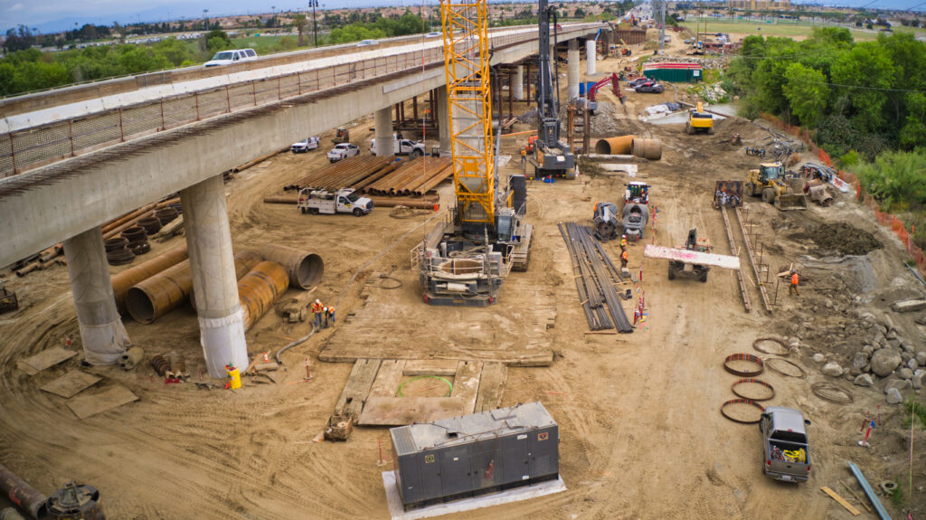 Crews drilling the foundation for the bridge cage.