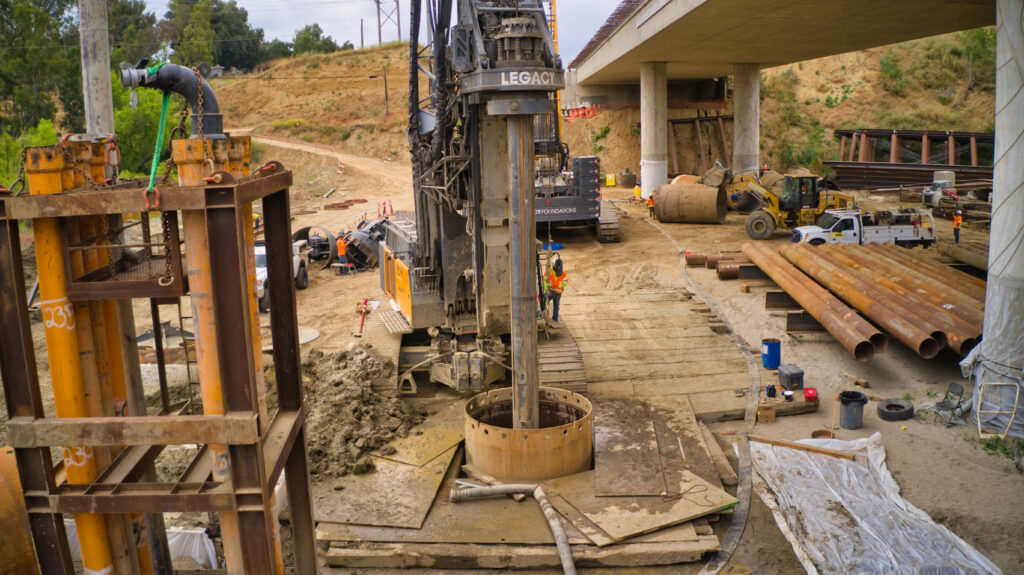 Crews drilling bridge foundations. 