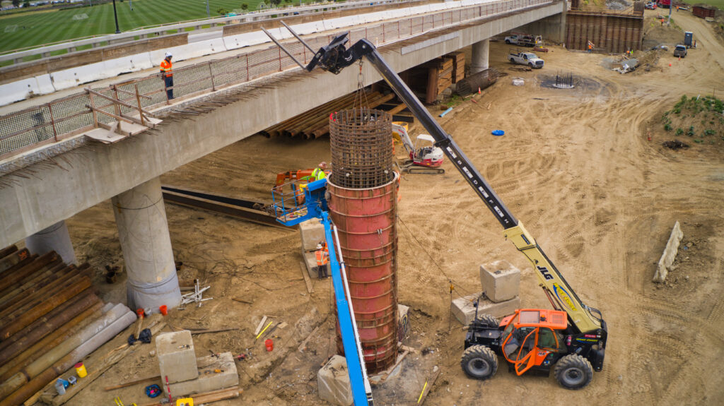 Crews setting the Hamner Ave. project bridge cage foundation 